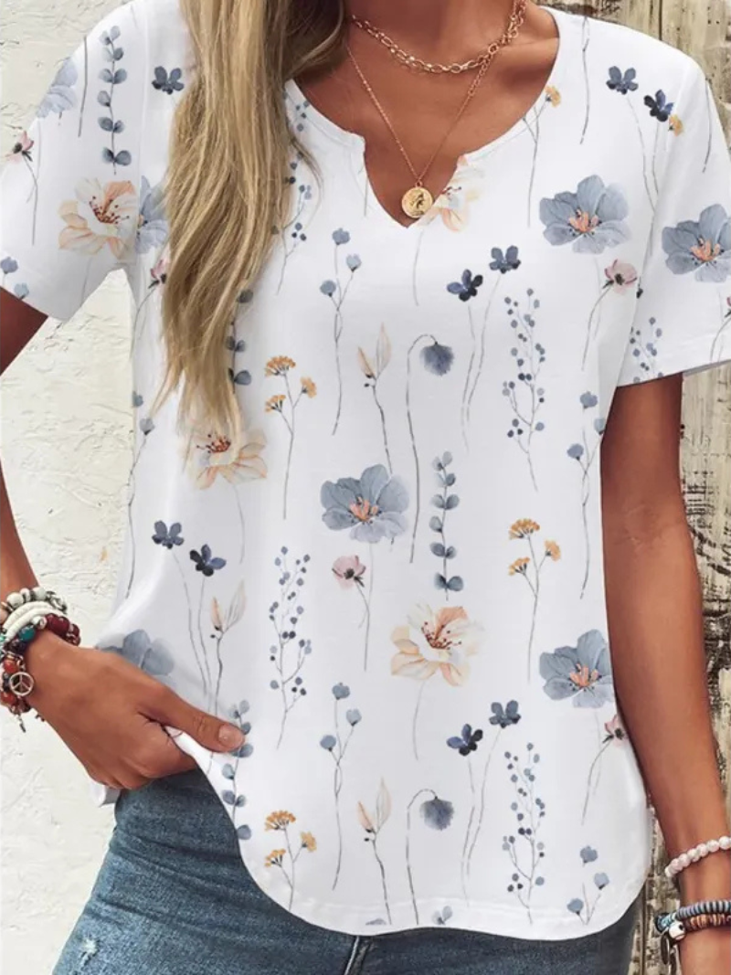 ELIA | ELEGANTE KNOPFBLUSE MIT BLUMEN